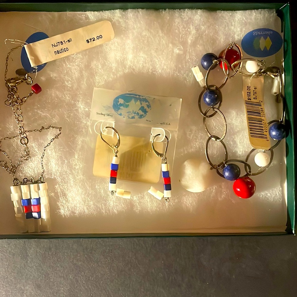 Set of 3 necklace ,bracelet , and earrings.